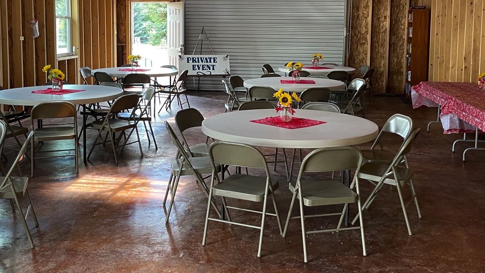 Sky Mountain Resort clubhouse arranged with tables and chairs for a private event